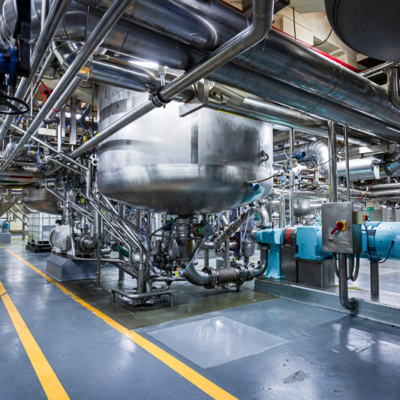 Stainless,Vertical,Steel,Tanks,And,Pipes,With,Pressure,Meter,In